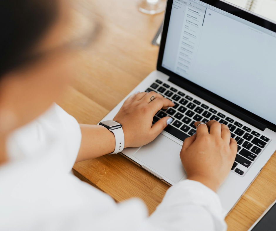 Person typing on a laptop